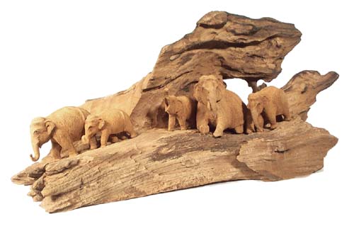 Wooden root with five elephfants