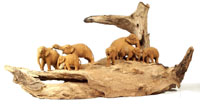 Wooden root with seven Elephants